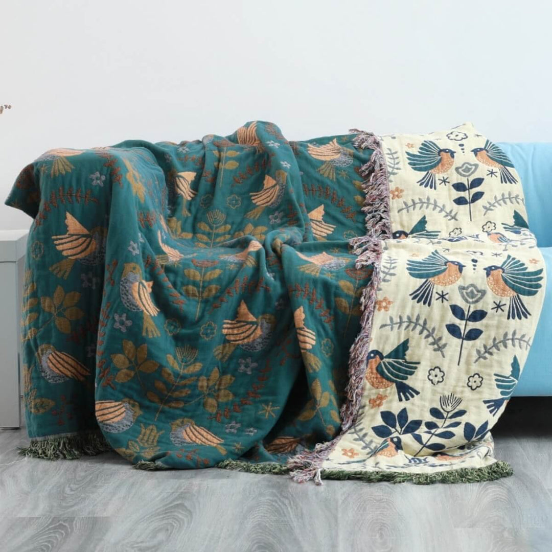 Plushley™ Reversible Scandinavian Bird Throw Blanket in Cotton
