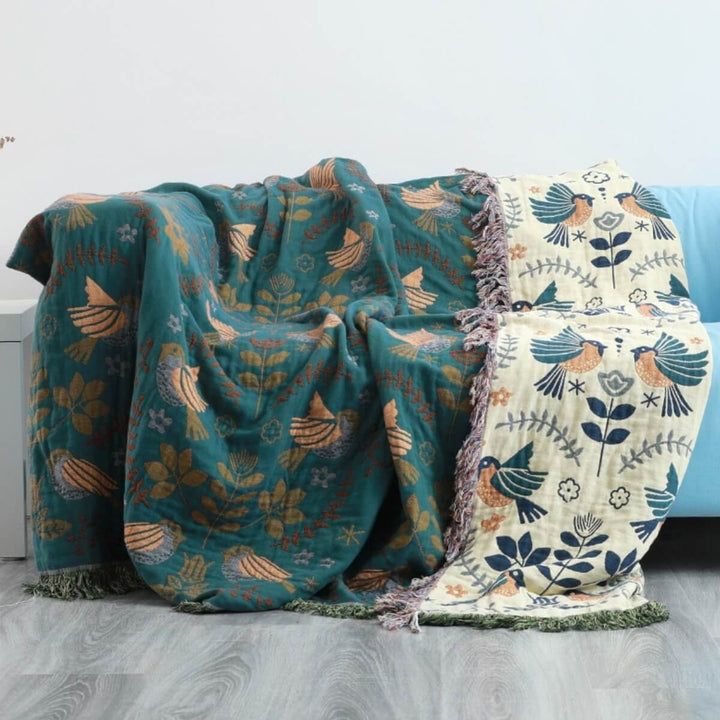 Plushley™ Reversible Scandinavian Bird Throw Blanket in Cotton