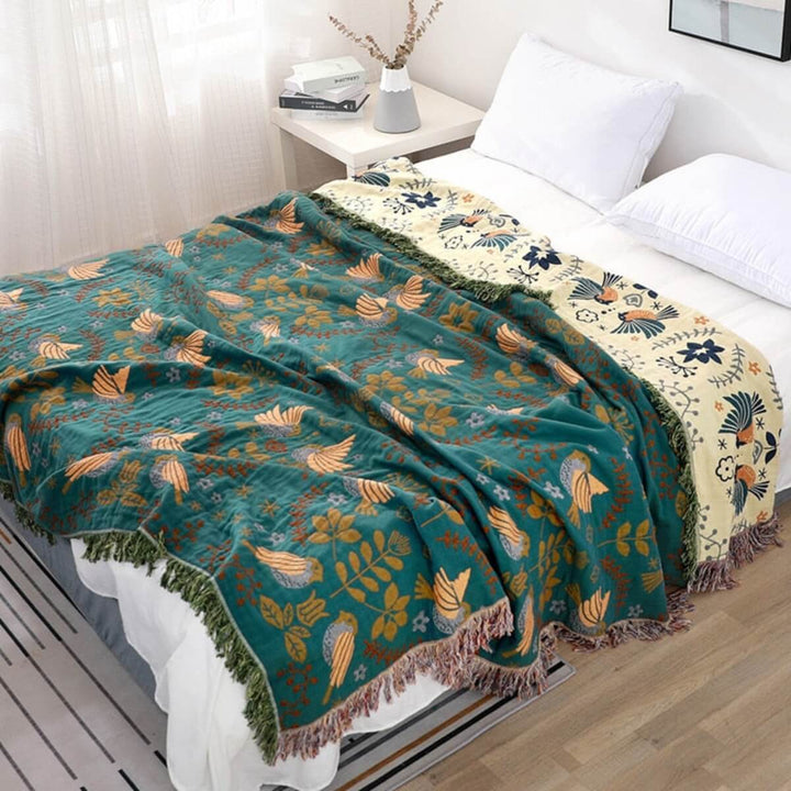Plushley™ Reversible Scandinavian Bird Throw Blanket in Cotton